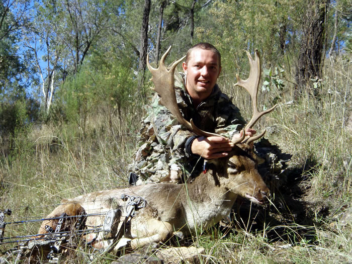 Justin with another nice buck taken during the 2013 rut.